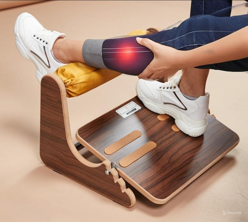 Wooden footrest for desk providing under desk leg support